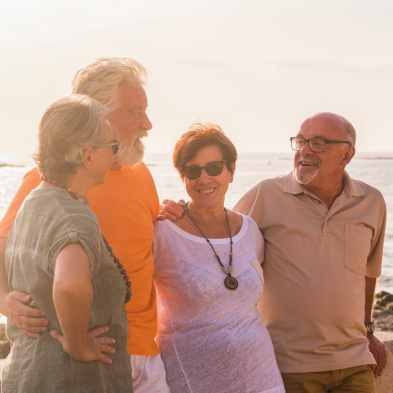 Couple giving financial advice on beach