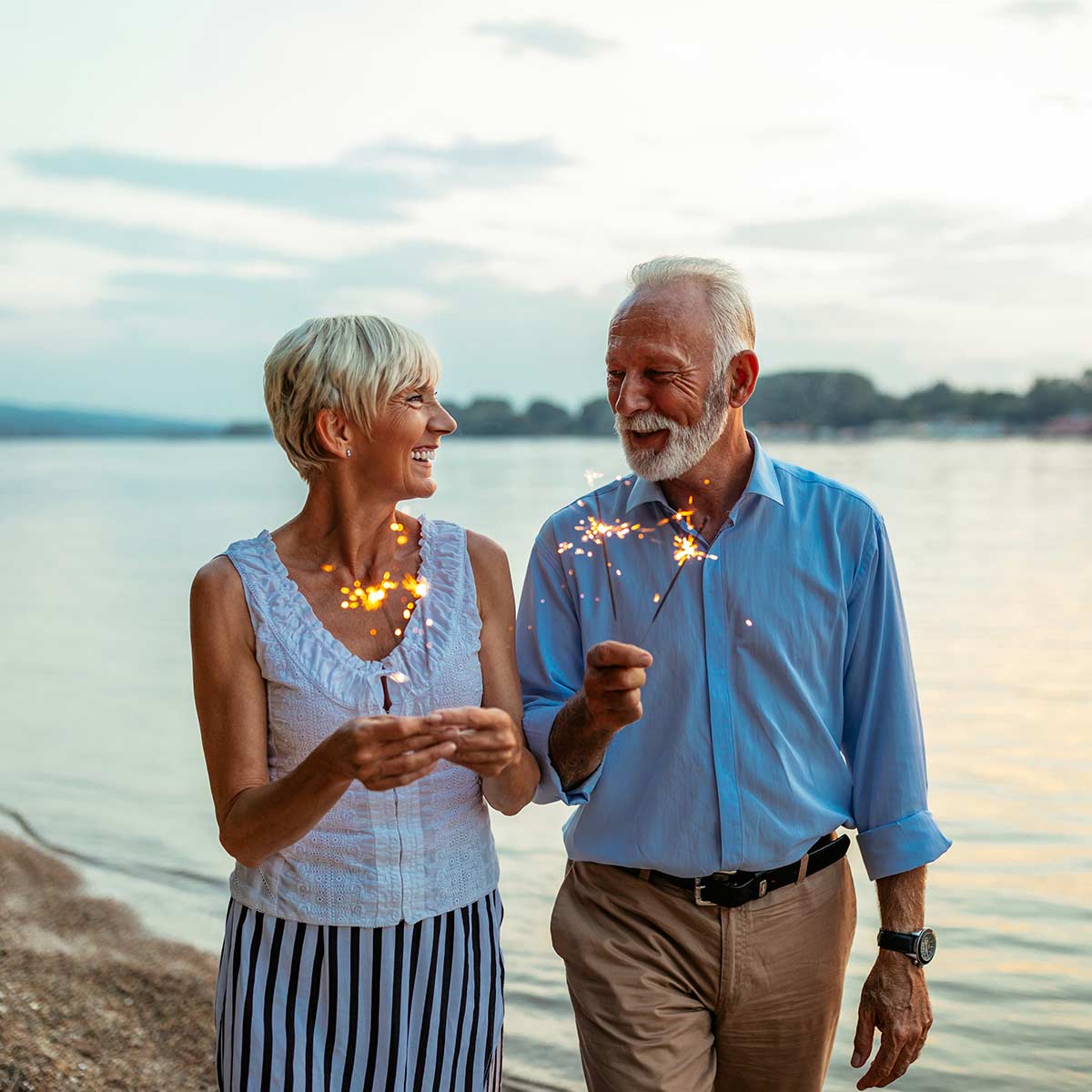 Older retired couple on beach