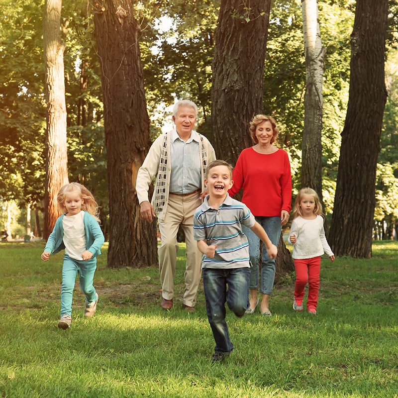 Financial Stable Grandparents Enjoying Retirement with Grandkids