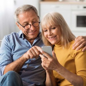 tn-tax-management Couple managing taxes on phone